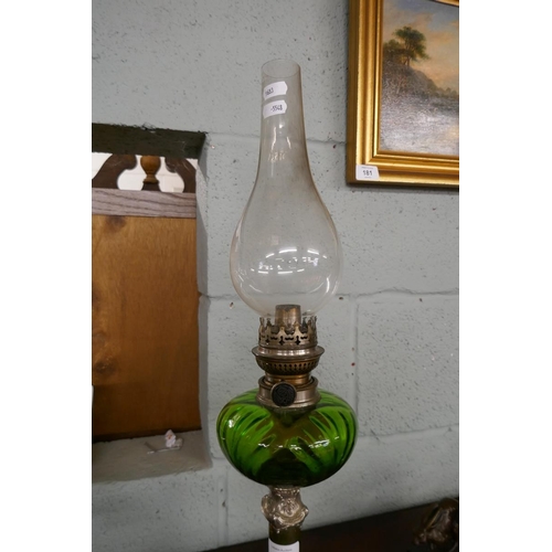 179 - Oil lamp with green glass reservoir