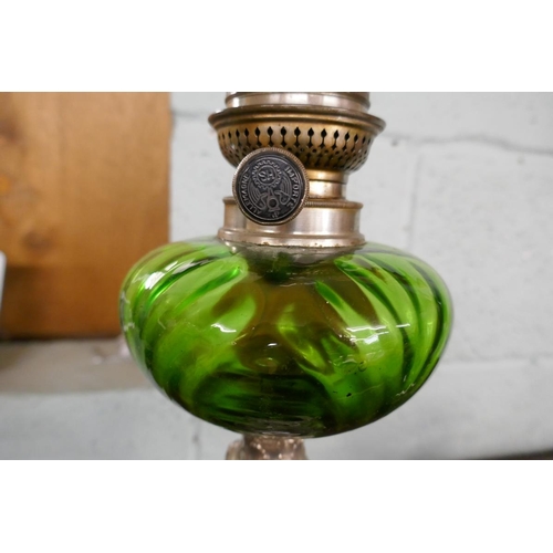 179 - Oil lamp with green glass reservoir