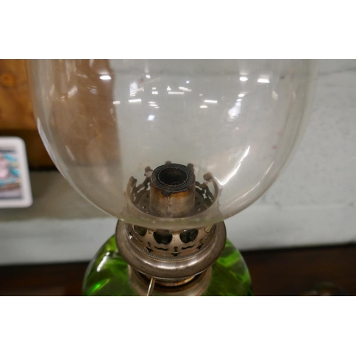 179 - Oil lamp with green glass reservoir