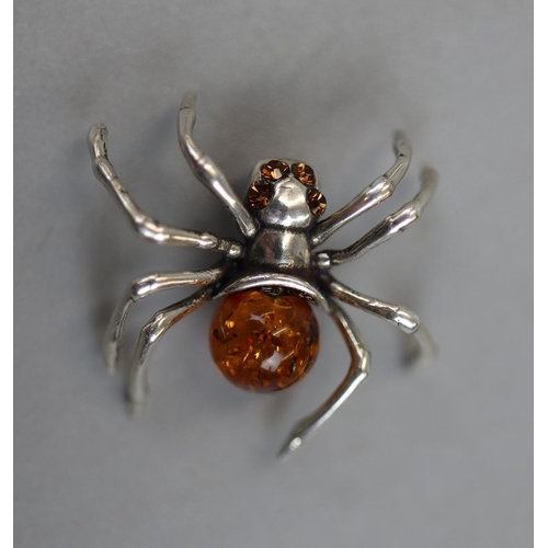 25 - Silver and amber set spider pendant