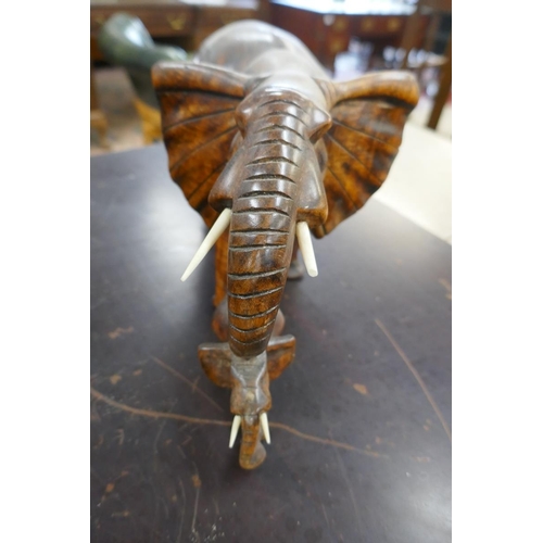 274 - Carved wooden figure of elephants - Approx height: 20cm