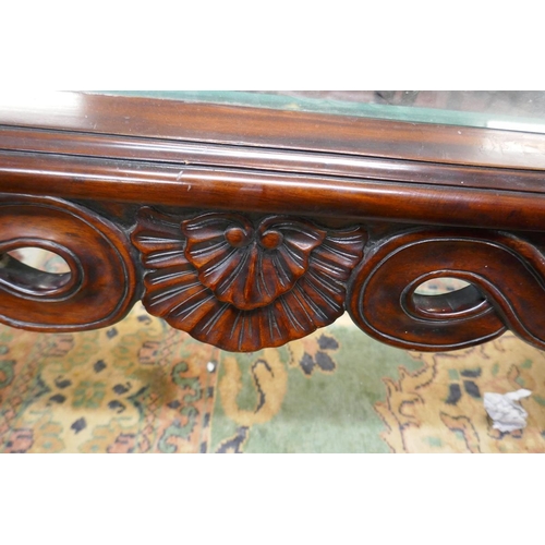 284 - Carved mahogany coffee table - Approx size L: 140cm W: 75cm H: 59cm