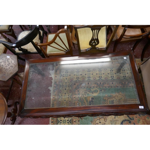 284 - Carved mahogany coffee table - Approx size L: 140cm W: 75cm H: 59cm