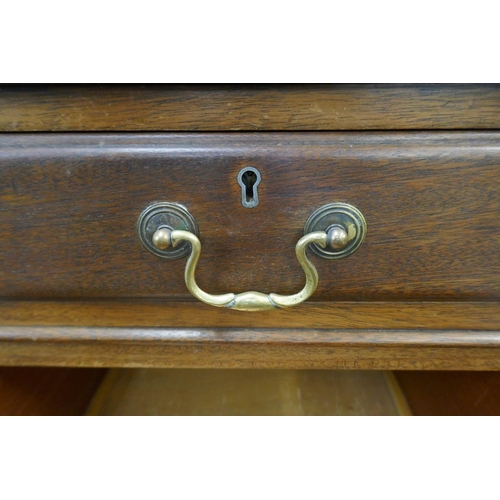 289 - Early 20thC oak desk with leather top - Approx size W: 152cm D: 91cm H: 76cm