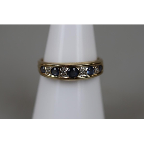 31 - Gold sapphire and diamond set ring - Approx size: M