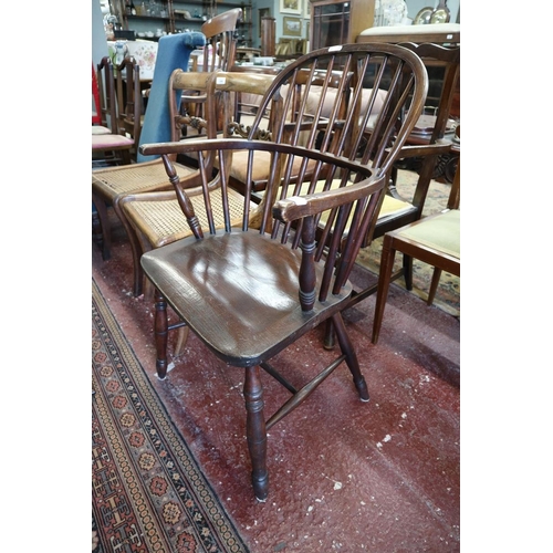 345 - Antique stick back elbow chair