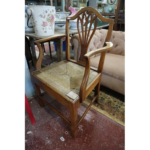 349 - Antique elm elbow chair