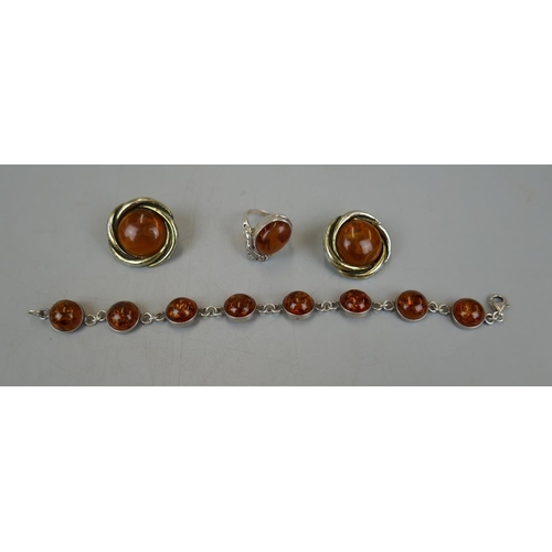 37 - Silver and amber bracelet and ring together with pair of amber earrings