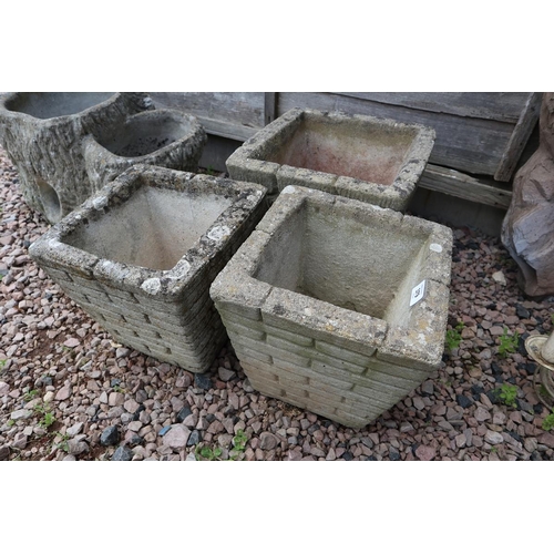 379 - 3 stone planters to include pair 