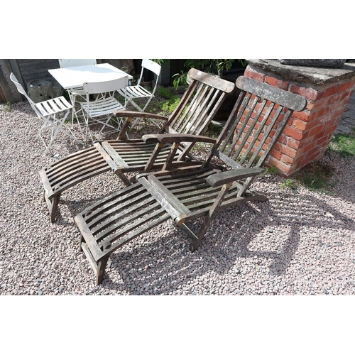 381 - Pair of teak steamer chairs