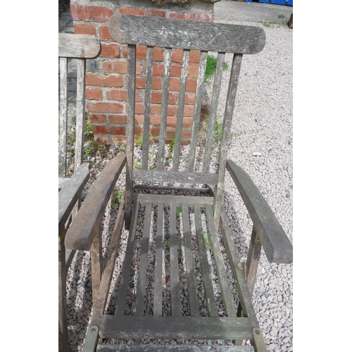 381 - Pair of teak steamer chairs