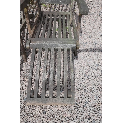 381 - Pair of teak steamer chairs