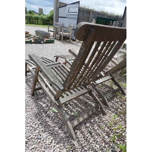 381 - Pair of teak steamer chairs