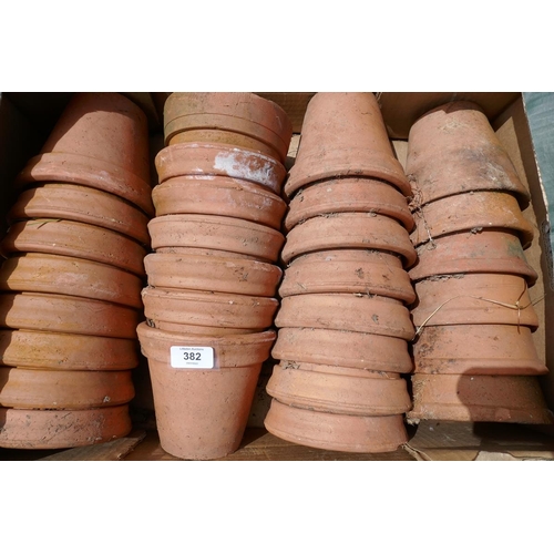 382 - Large collection of terracotta plant pots 