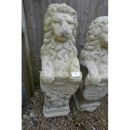 389 - Pair of stone lions - Approx height: 85cm