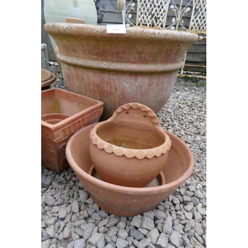 392 - Collection of terracotta planters 