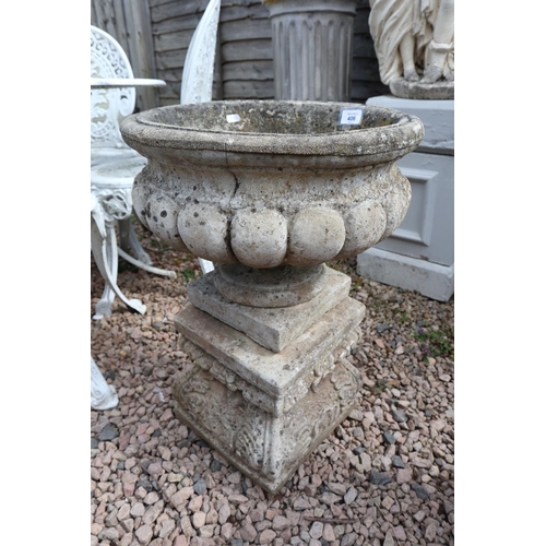 406 - Stone planter on plinth 