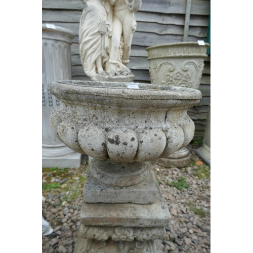 406 - Stone planter on plinth 