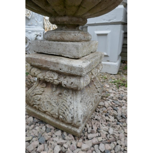 406 - Stone planter on plinth 