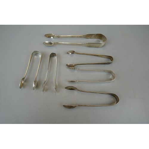 7 - 6 pairs of hallmarked silver tongs - Approx. weight 138g