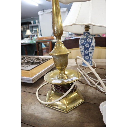 149 - 2 brass lamps together with a blue and white lamp