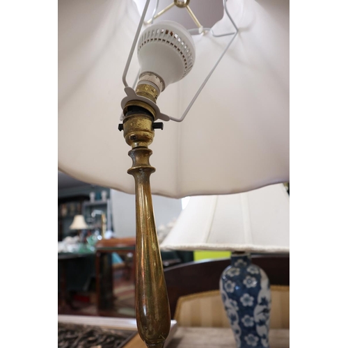 149 - 2 brass lamps together with a blue and white lamp