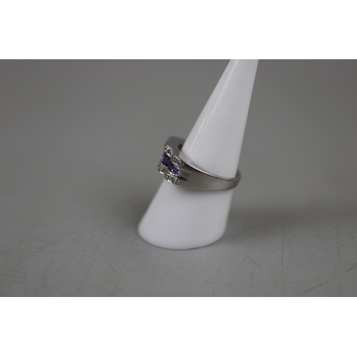 18 - 18ct white gold tanzanite and diamond ring - Approx size: P