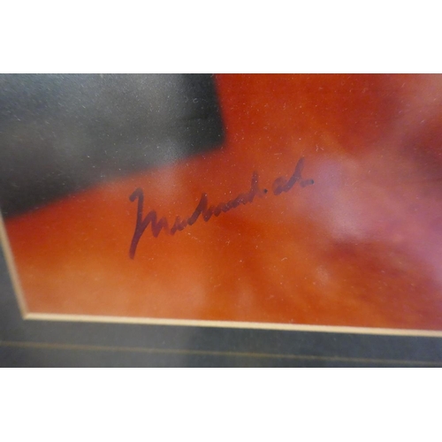 196 - Signed Muhammad Ali Ltd edition print 58/100 with C.O.A together with a framed film cell of the Muha... 