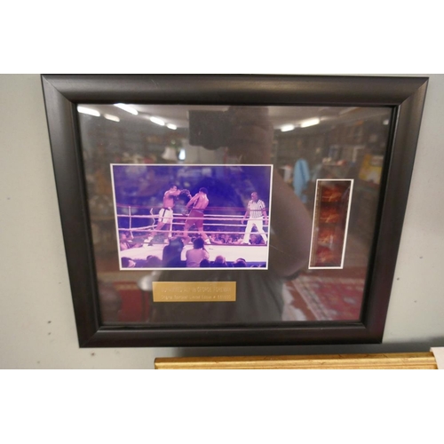 196 - Signed Muhammad Ali Ltd edition print 58/100 with C.O.A together with a framed film cell of the Muha... 