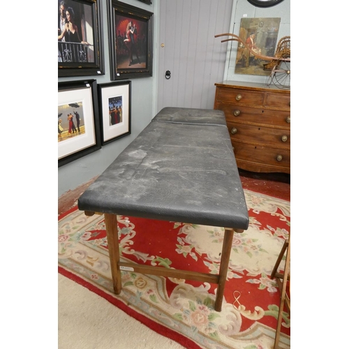 207 - Massage table by Doherty Medical