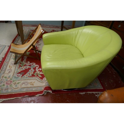 213 - Retro green leather swivel chair