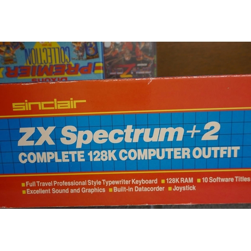 227 - ZX Spectrum + 2 complete 128K computer outfit with 9 games