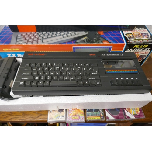 227 - ZX Spectrum + 2 complete 128K computer outfit with 9 games