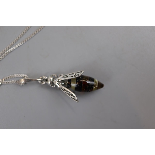 23 - Silver and amber hornet pendant on chain