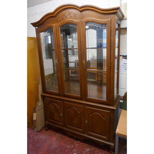 232 - Large glazed display cabinet on base - Approx size: W: 132cm D: 44cm H: 214cm