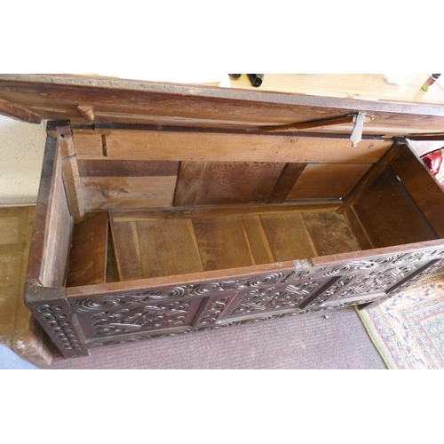 247 - Antique carved oak coffer with candle box - Approx size: W: 141cm D: 57cm H: 65cm