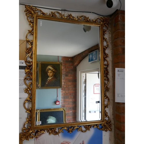 248 - Ornate gilt framed bevelled glass mirror