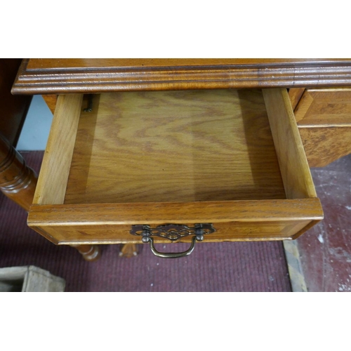 255 - Queen Anne style walnut 2 domed bookcase with a glazed top sitting on cabriole legs on ball and claw... 