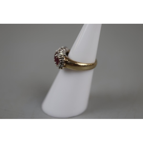 28 - Gold ruby and diamond set ring - Approx size: J