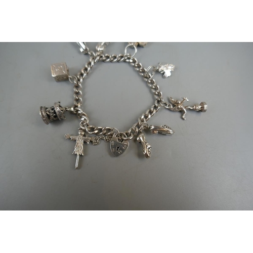 31 - Silver charm bracelet