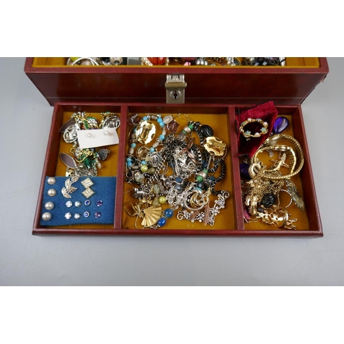 38 - Musical jewellery box and contents