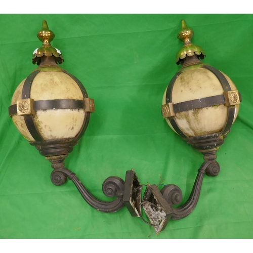 94 - Pair of ornate wrought iron orb wall lights