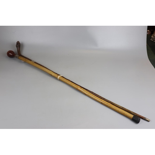 153 - 2 silver mounted walking sticks