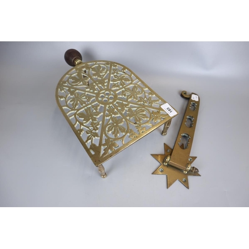 185 - Brass trivet and spit jack bracket