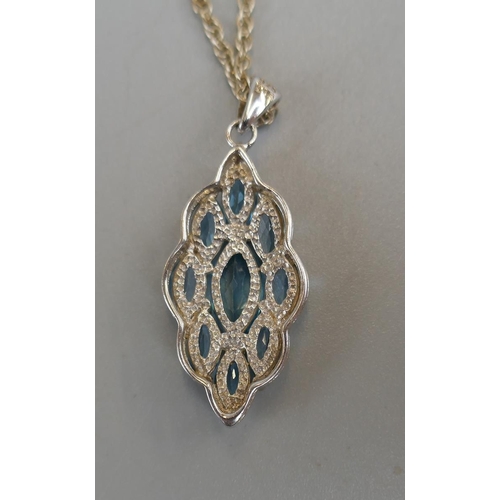 23 - Silver blue topaz pendant on chain