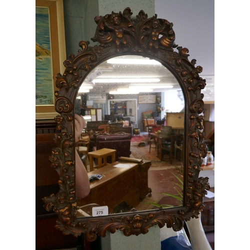 275 - Ornate mirror adorned with cherubs