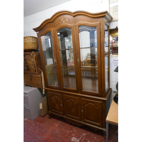 291 - Large glazed display cabinet on base - Approx size: W: 132cm D: 44cm H: 214cm