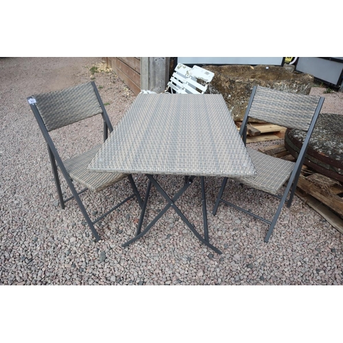 473 - Folding rattan table with 2 chairs