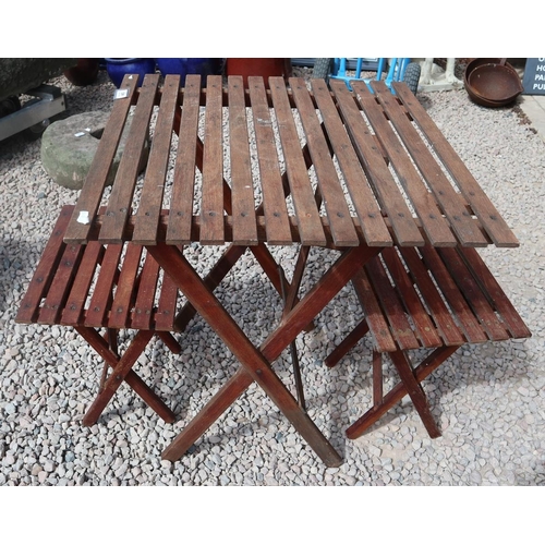 483 - Folding wooden table and chairs