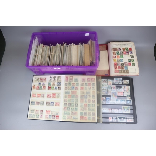 86 - 3 stamp albums and a collection of loose postcards